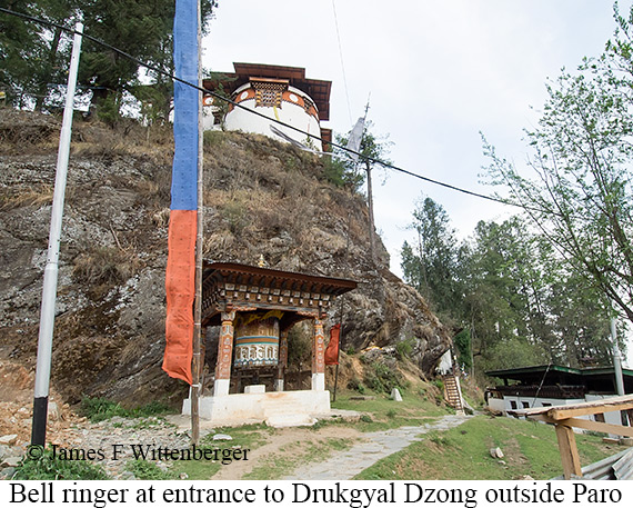 Bell ringer at entrance to Drugyal Dzong in Paro - © James F Wittenberger and Exotic Birding LLC